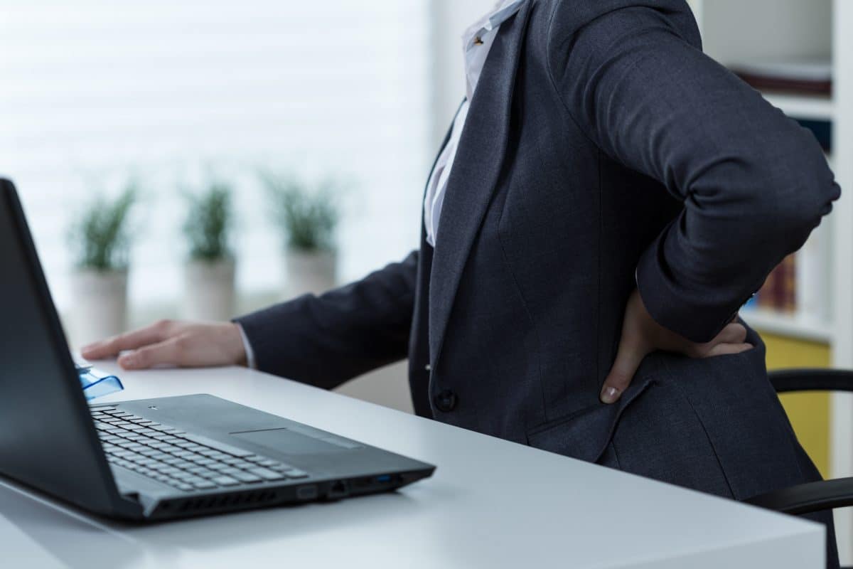 Sitting all day is easy on your knees, but hard on your back. See a chiropractor for pain relief.