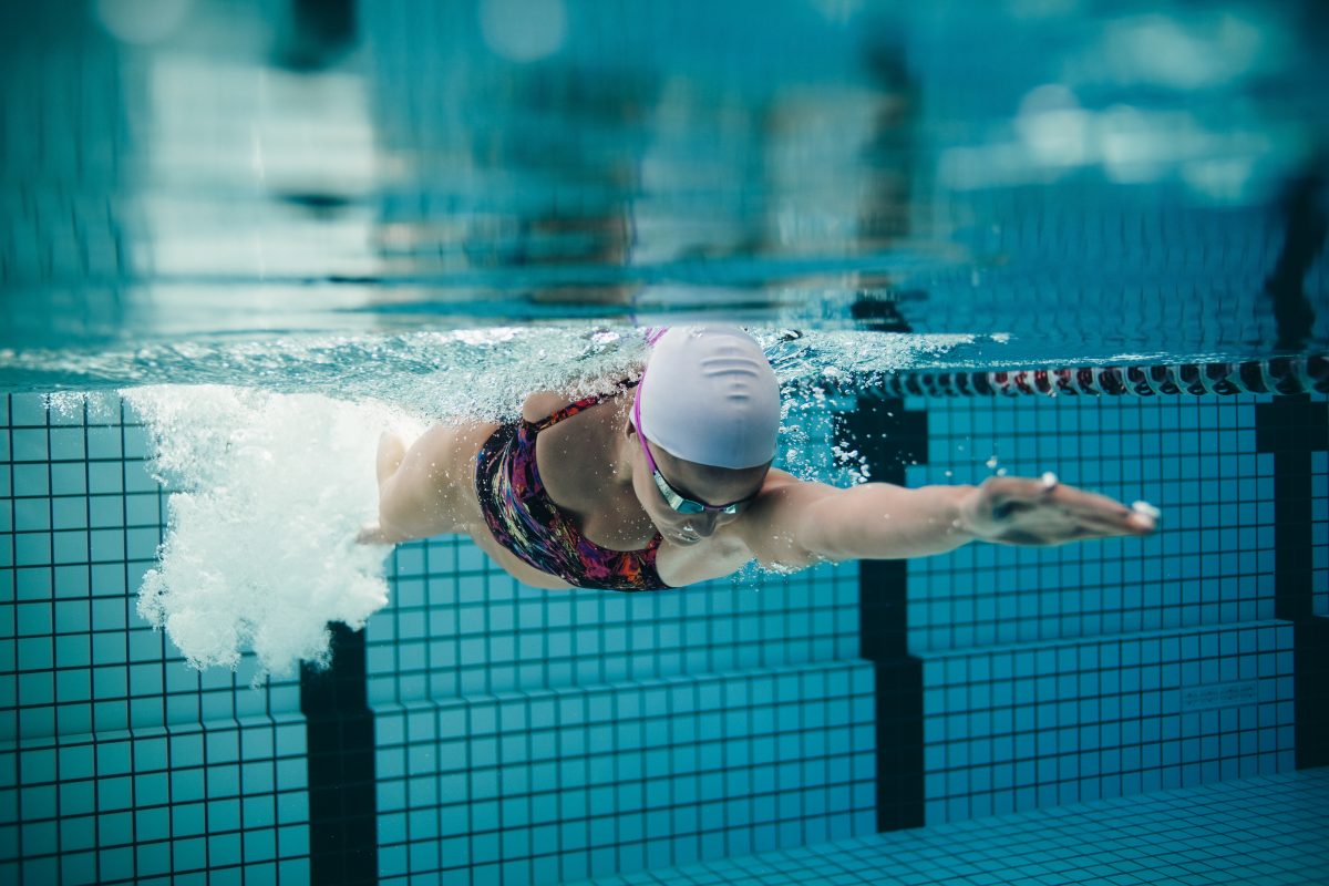 underwater shot of female athlete swimming